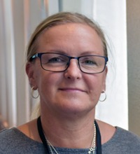 Annikki Björnlund porträtt ler i kameran