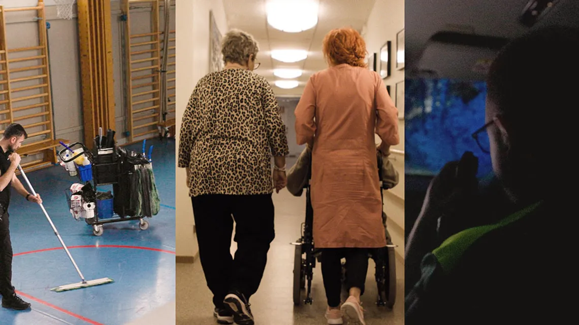 En grupp människor som går längs en korridor.